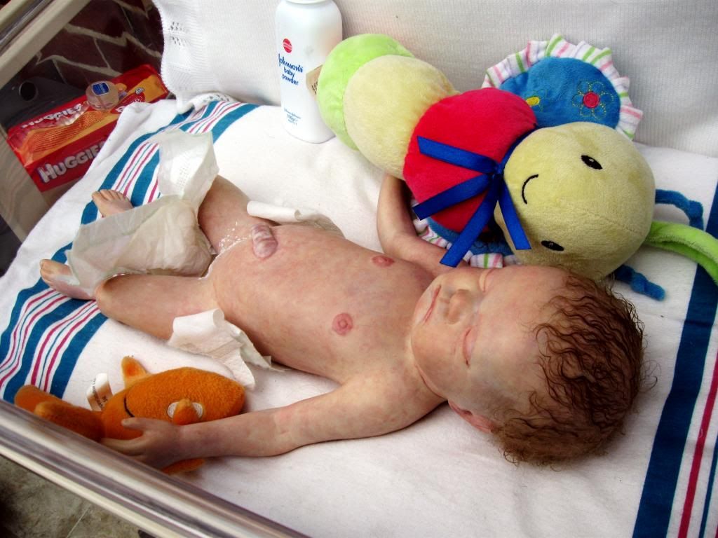 Reborn full body preemie girl from hospital training doll. silicone